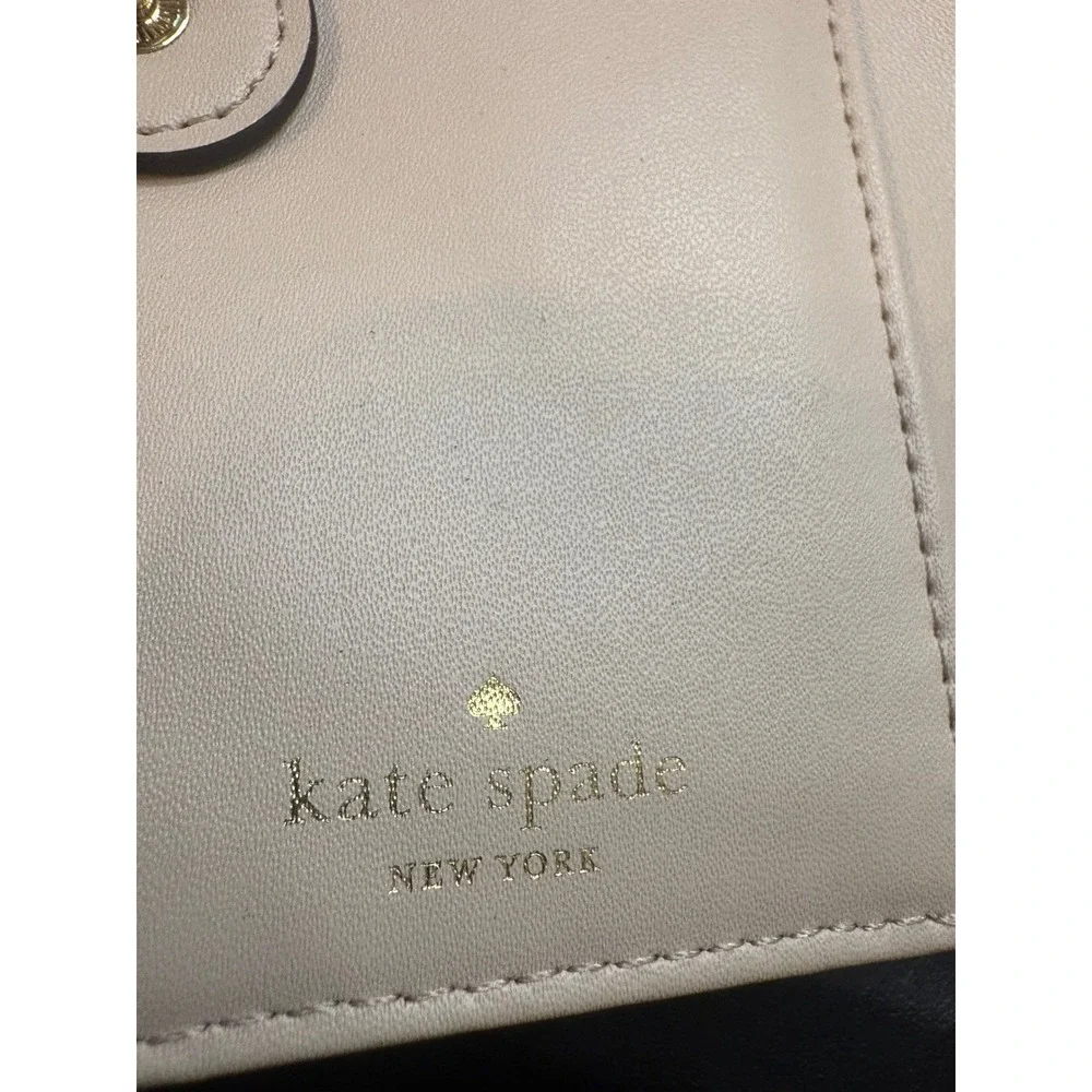 Kate Spade New York Beige Pebbled Leather Bifold Wallet Gold Logo Plaque